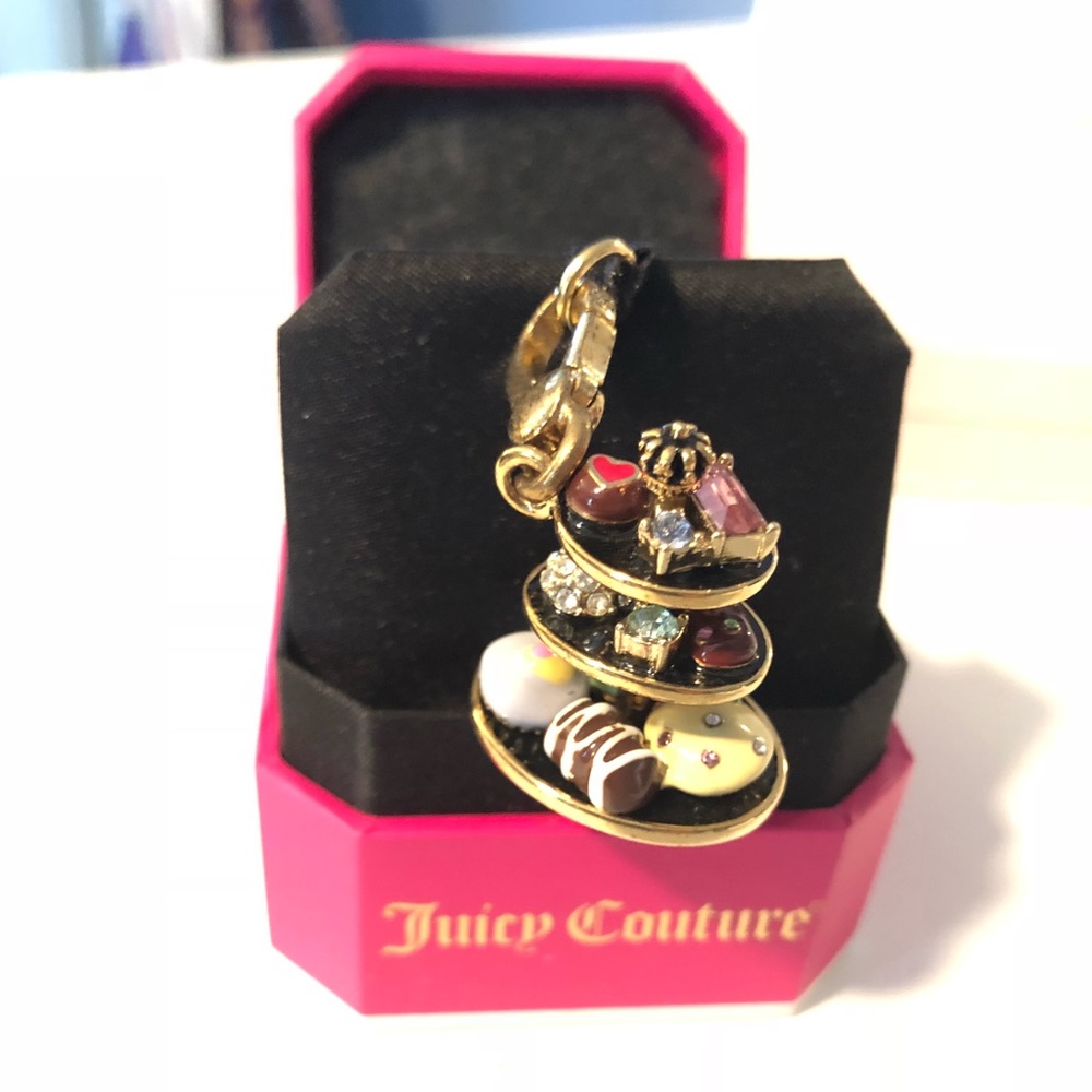 Juicy pastry on tiered tray charm